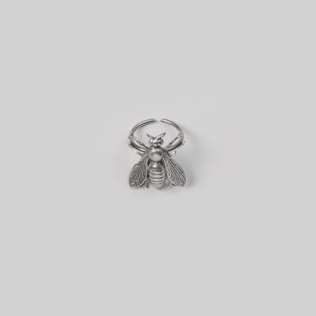 milk-of-lime-pollination-ring-statement-fingerring image 1