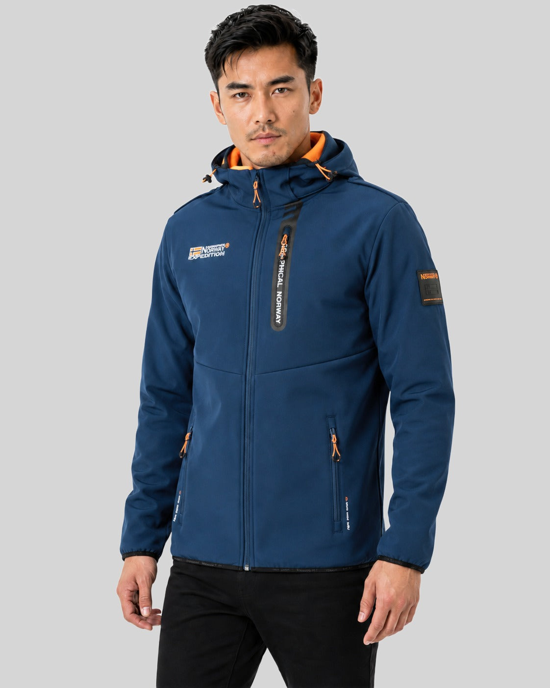 geographical-norway-toxique-herren-softshelljacke-marine-orange-kapuze image 1